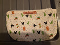 Handmade white makeup bag with Mickey Mouse ears and Christmas icons pattern