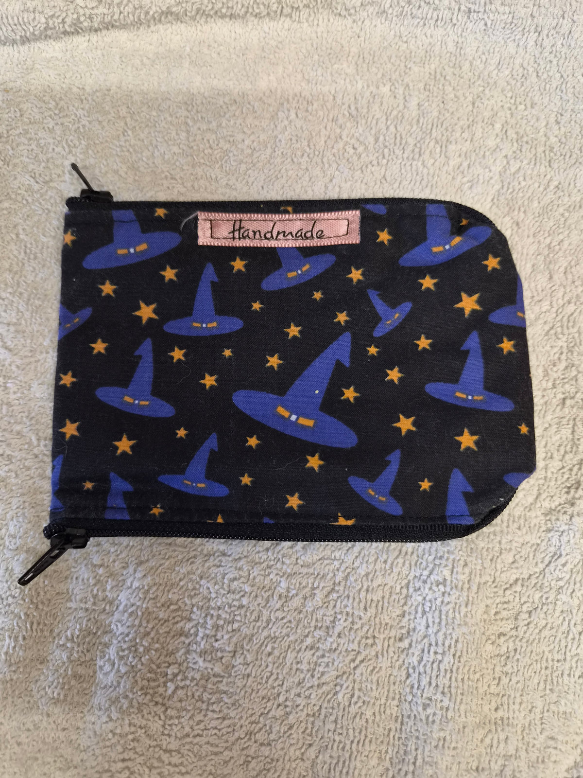 Handmade zip pouch with witch hat and star print fabric